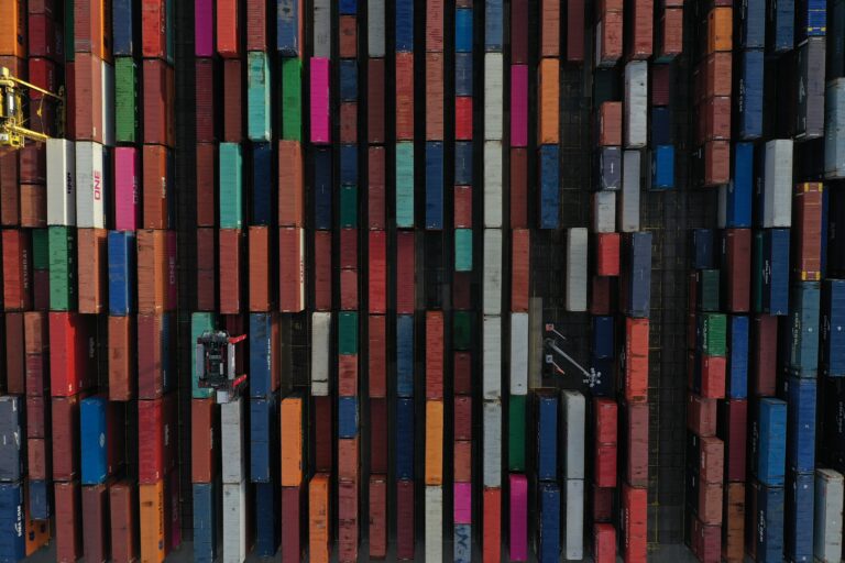 Aerial drone photography showing a field of shipping containers